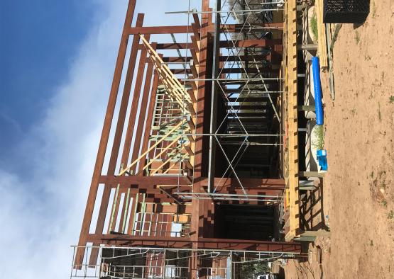 a building under construction with scaffolding