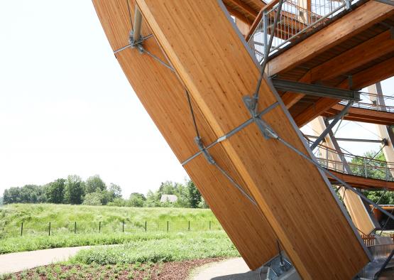 a wooden structure with a metal railing