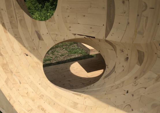 a wood structure with holes