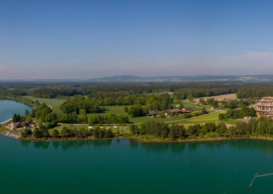 a body of water with a body of water and a house on the side