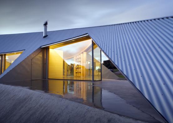 a building with a triangular roof