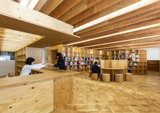 people in a library with a couple of people