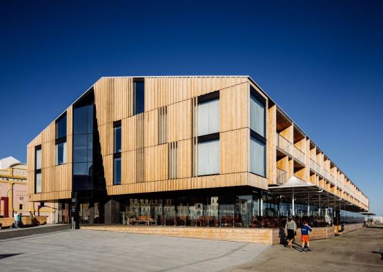 a building with a glass wall and a large glass wall