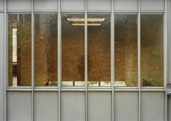 a glass wall with a window