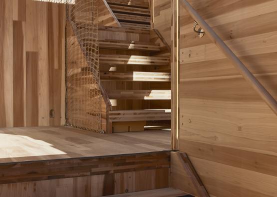 a wooden staircase in a building