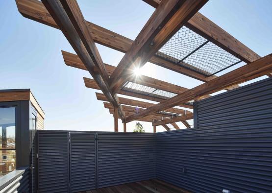 a wooden roof with a metal structure