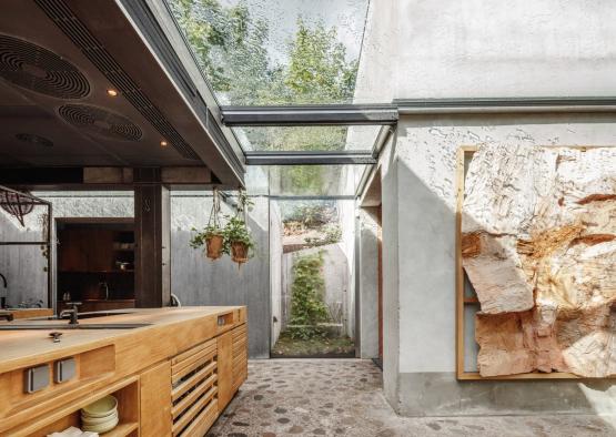 a kitchen with a glass ceiling