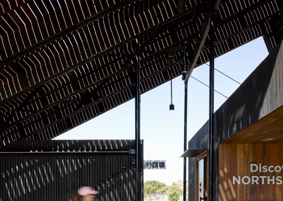 a woman walking in a building