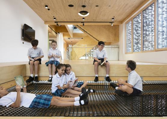 a group of children sitting on the floor