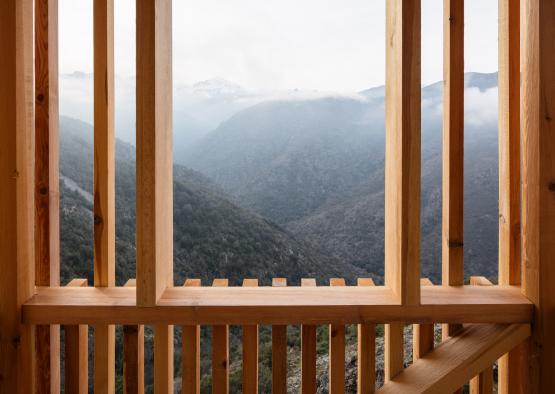 a view of mountains from a window