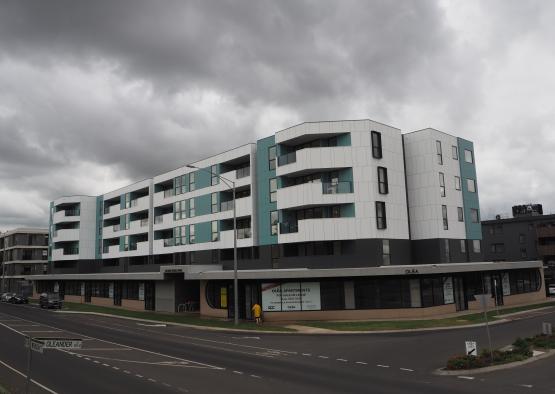 a building with a street and a road