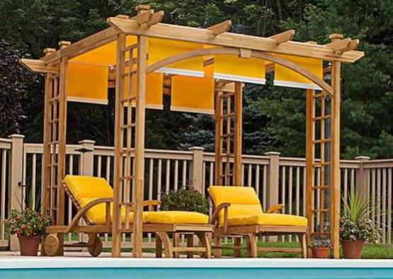 a wooden structure with yellow cushions