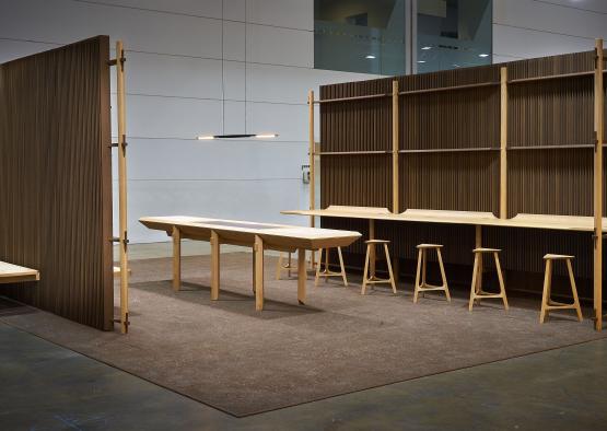 a room with tables and stools
