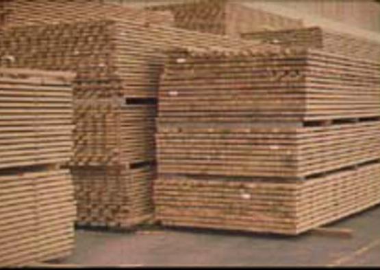 a stack of wood in a warehouse