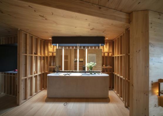 a bathroom with a large counter and a mirror