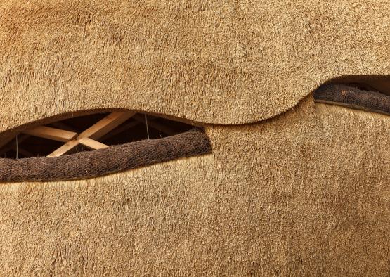 a close up of a thatched roof