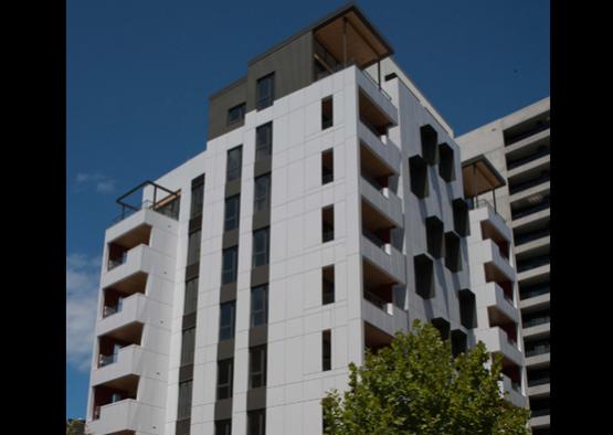 a white building with black windows