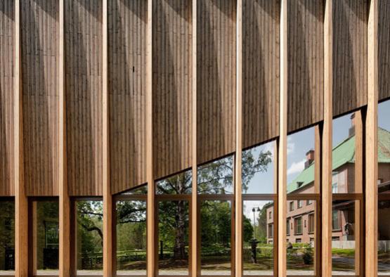 a building with a wood paneled wall