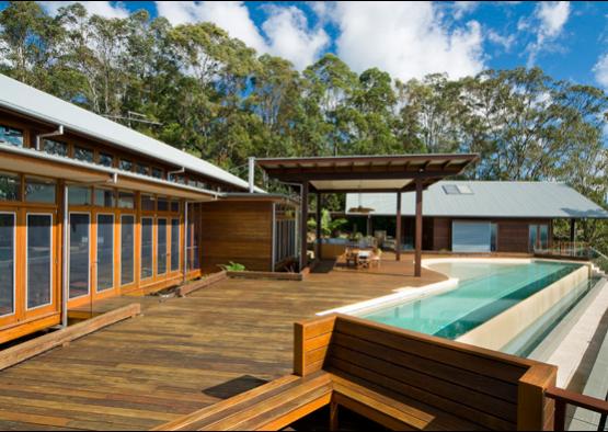 a house with a pool and a deck