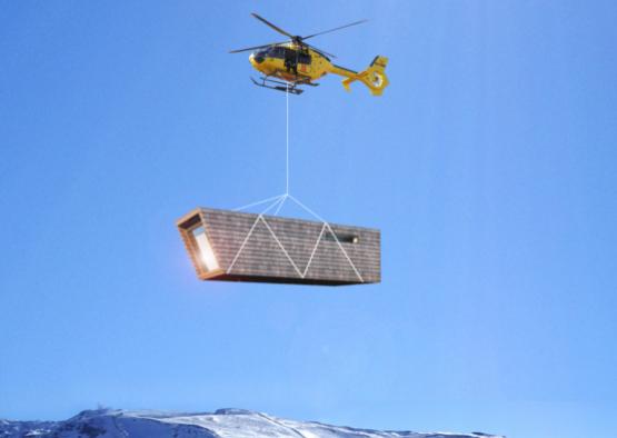 a helicopter flying over a house