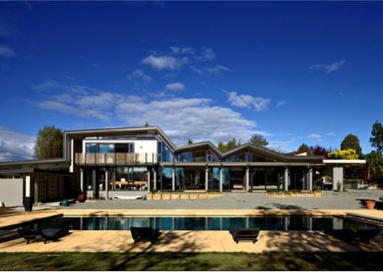 a house with a pool in the back