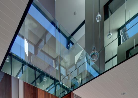 a glass railing on a staircase
