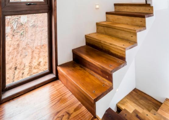 a wooden stairs in a house