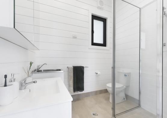 a bathroom with a shower and sink