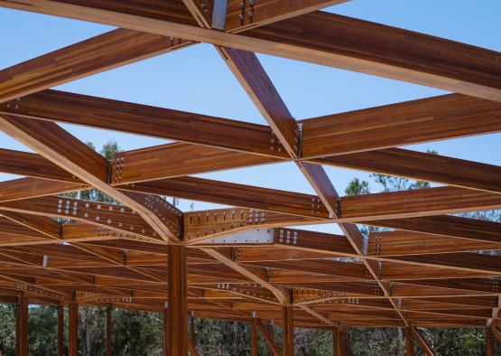 a wood structure with blue sky
