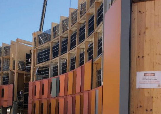 a building under construction with a crane