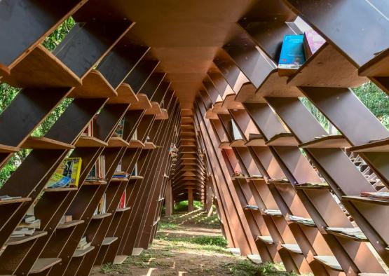 a structure made of wood and books