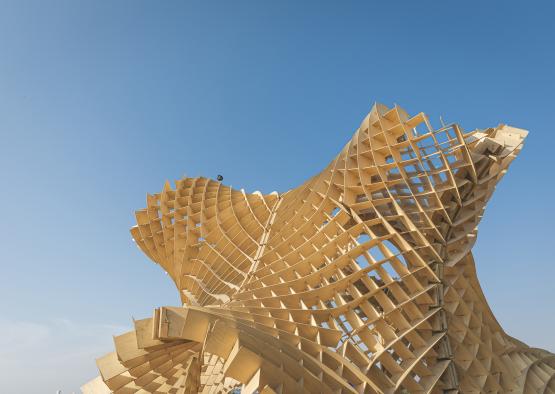 a wooden structure with a blue sky