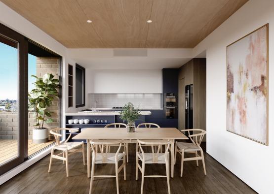 a dining table and chairs in a room