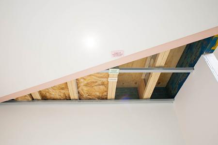 a roof with a window and a glass window