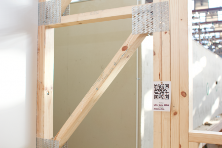 a wooden frame with a qr code on it