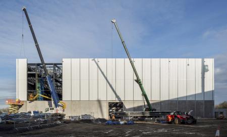 a crane lifting a large metal object