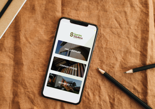 a phone with a screen on it and two pencils