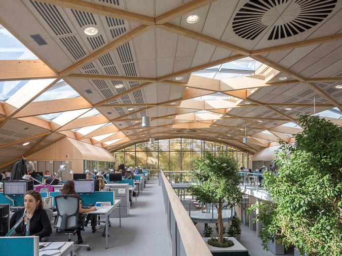 a room with people working at computers