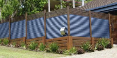 a blue corrugated metal wall