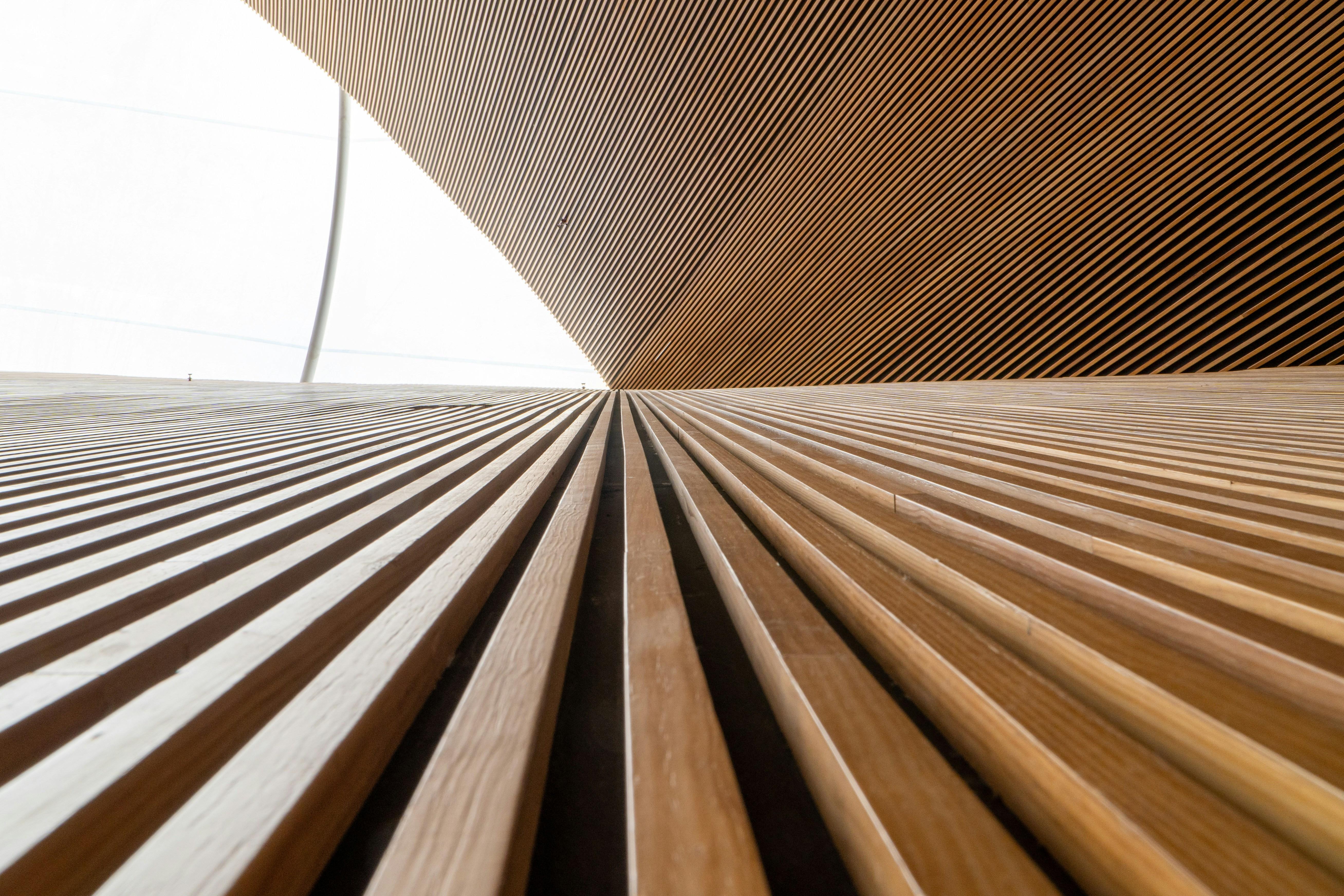 Looking up through timber panelled walls