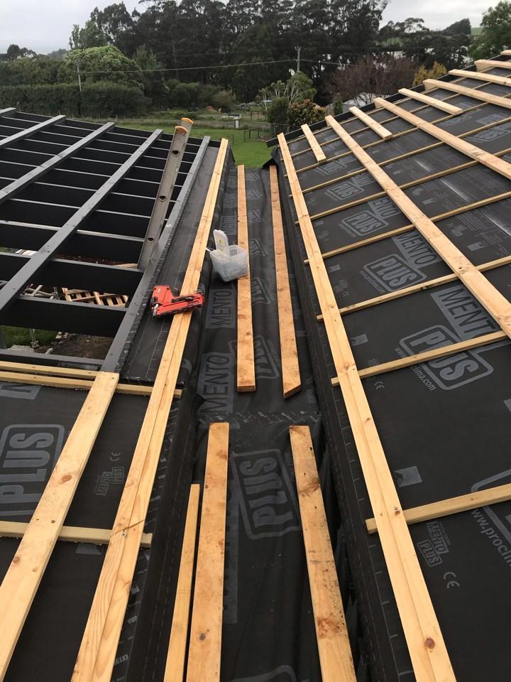 Timber being installed on roof during construction