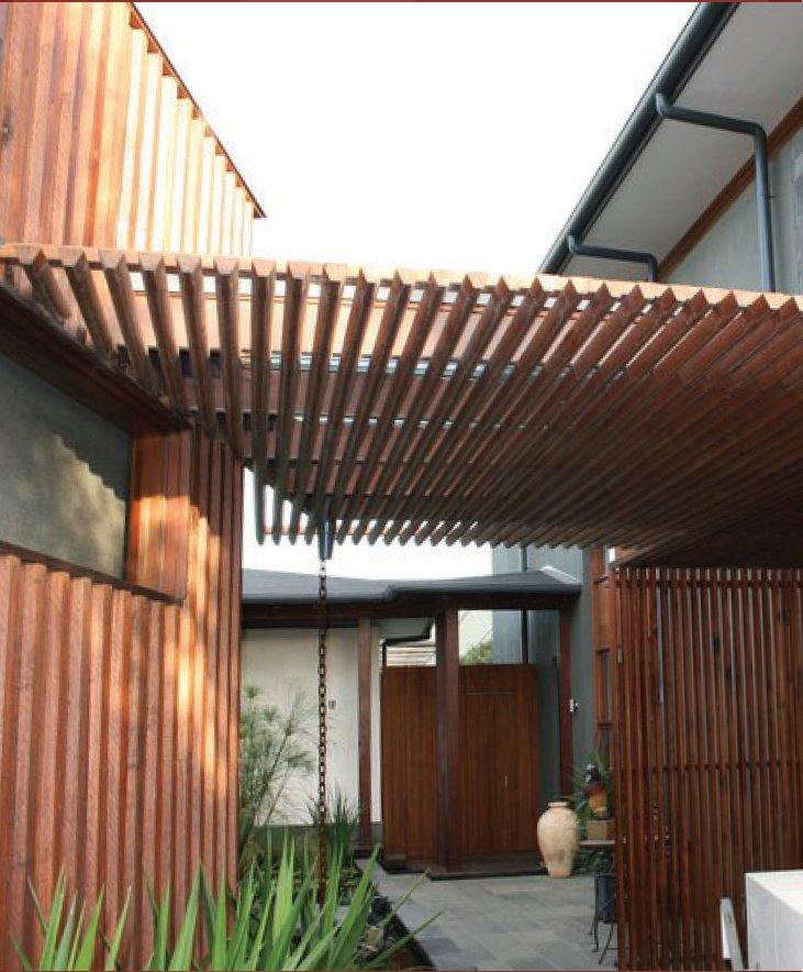 a wooden structure with a chain attached to it