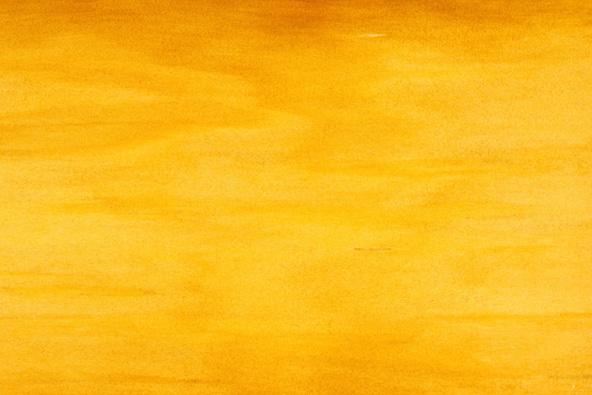 a yellow surface with a lot of streaks