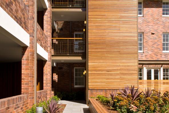 a building with a wood wall