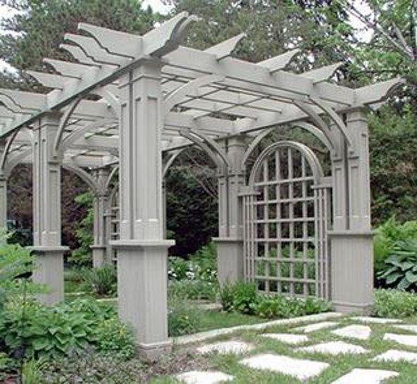 a pergola in a garden