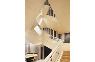 a wooden staircase with a triangular design