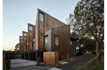 a building with a wood paneled roof