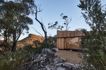 a building in the woods