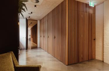 a hallway with wood panels