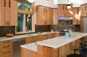 a kitchen with wooden cabinets and a countertop